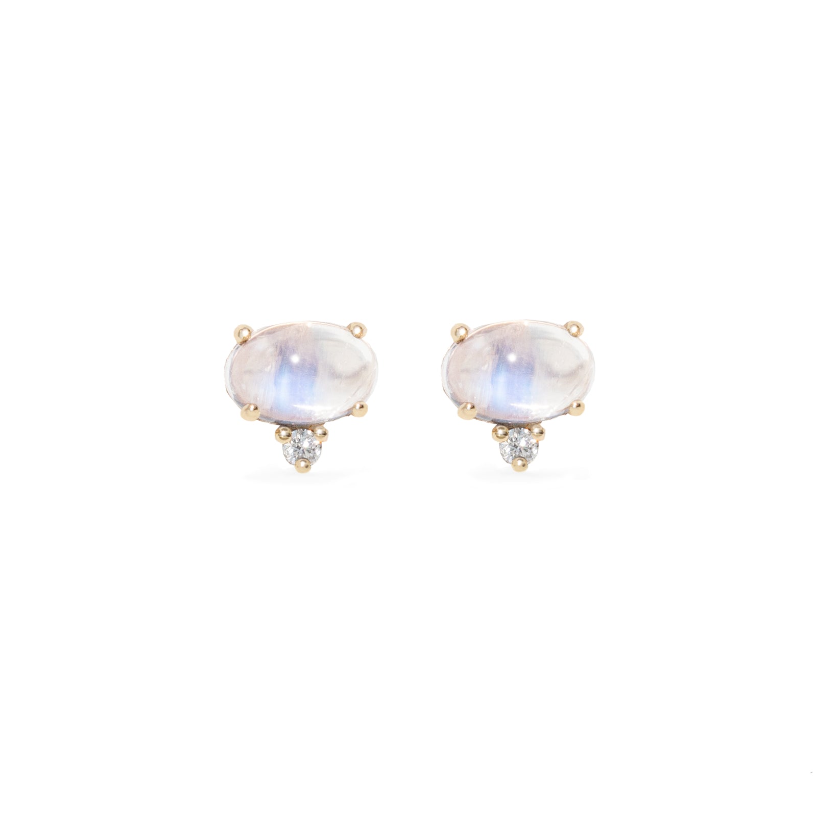 Pair of oval-shaped with a white diamond earrings on a white background