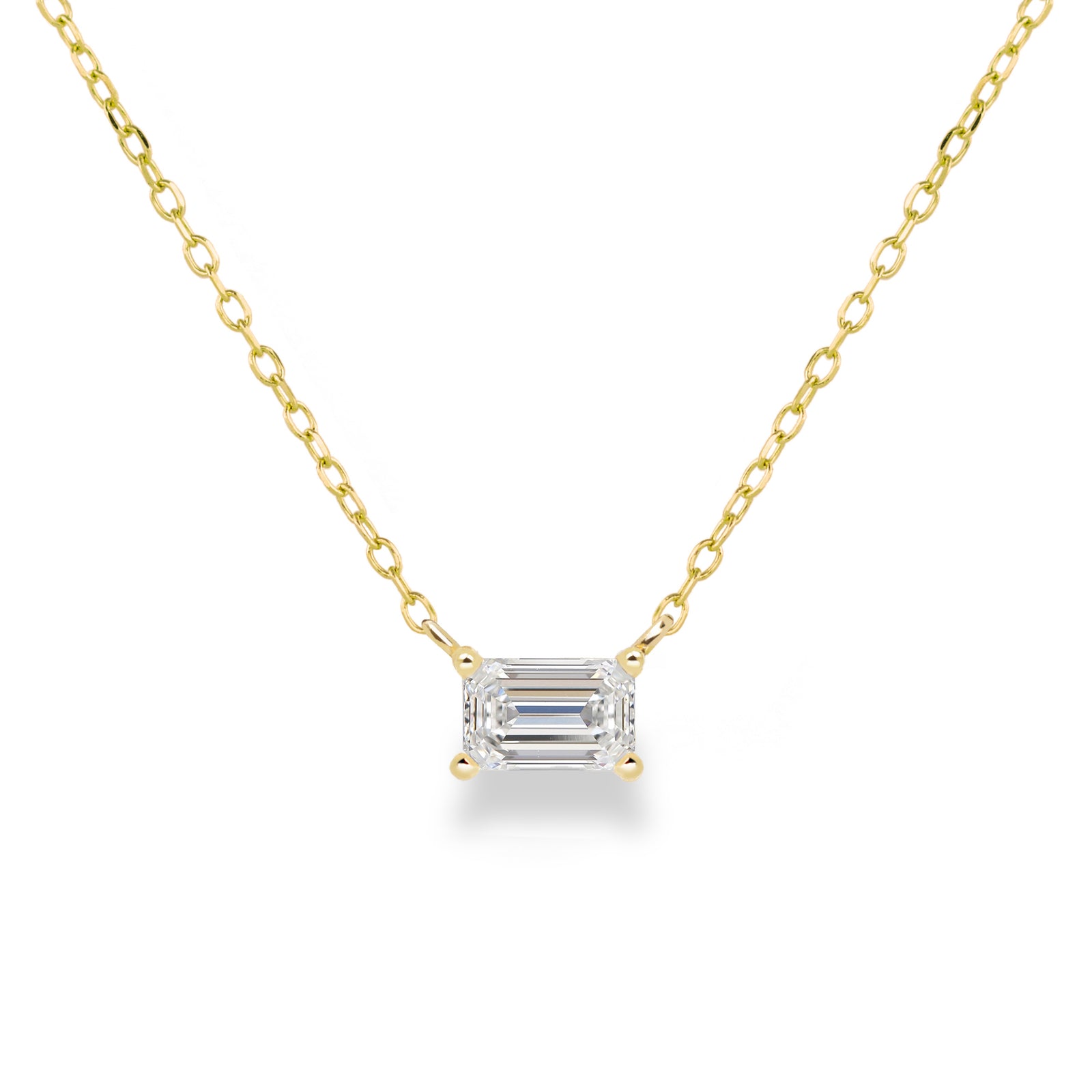 Jamie Park Jewelry Emerald Cut Diamond Solitaire Necklace This Emerald Diamond Solitaire Necklace features a sparkling lab diamond, set in a classic four prong design. With each diamond certified by IGI, this necklace makes for a timeless and cherished gift, perfect for any special occasion. Add a touch of elegance to any outfit with this beautiful piece. Chain length 16-18" 