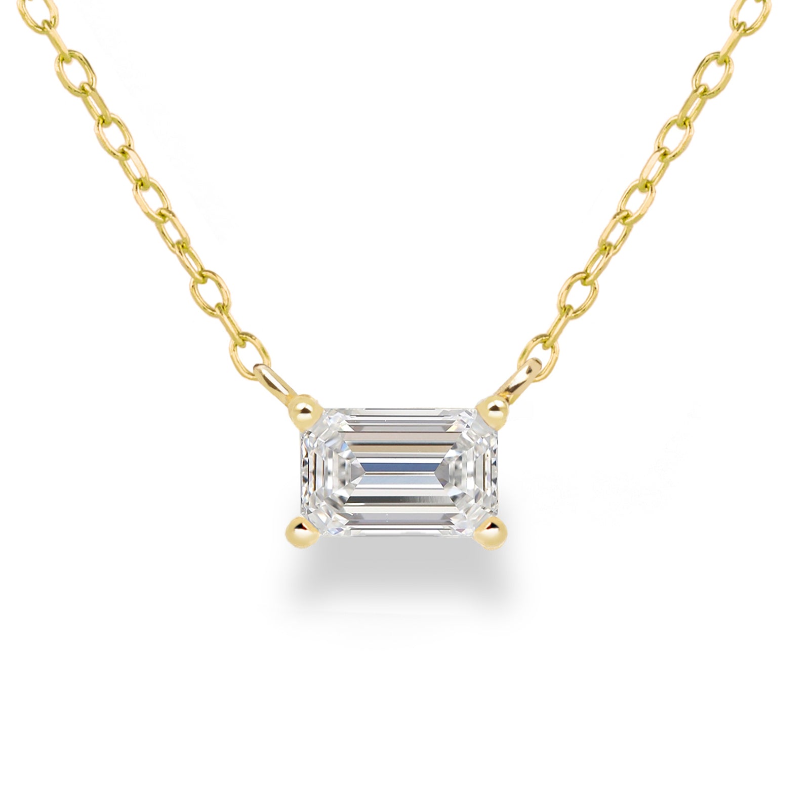 Jamie Park Jewelry Emerald Cut Diamond Solitaire Necklace This Emerald Diamond Solitaire Necklace features a sparkling lab diamond, set in a classic four prong design. With each diamond certified by IGI, this necklace makes for a timeless and cherished gift, perfect for any special occasion. Add a touch of elegance to any outfit with this beautiful piece. Chain length 16-18" 