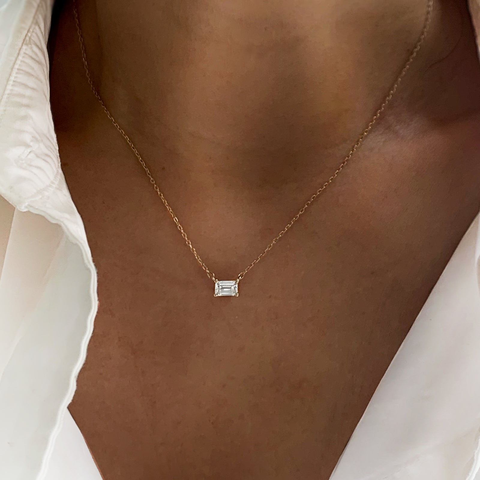Jamie Park Jewelry Emerald Cut Diamond Solitaire Necklace This Emerald Diamond Solitaire Necklace features a sparkling lab diamond, set in a classic four prong design. With each diamond certified by IGI, this necklace makes for a timeless and cherished gift, perfect for any special occasion. Add a touch of elegance to any outfit with this beautiful piece. Chain length 16-18" 