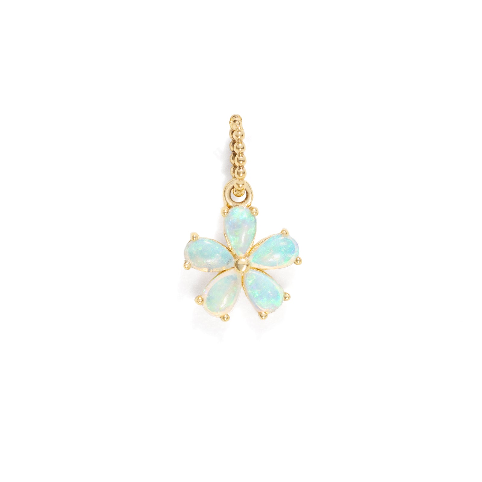 opal gemstone set on a gold flower shaped charm