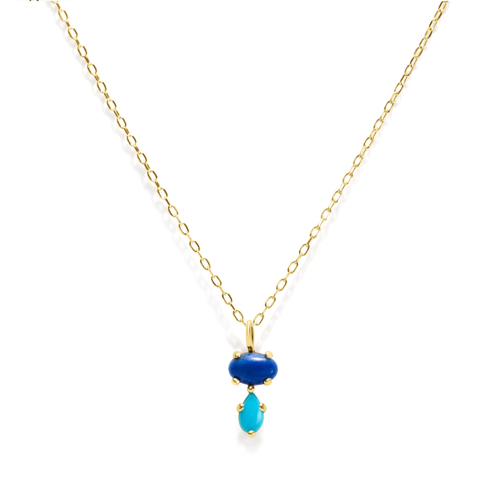 Add a vibrant touch of color with our Bubble Drop Necklace, featuring an oval lapis lazuli and a pear-cut turquoise, set in solid 14K gold. Inspired by the beauty of a cool summer night by the beach, this delicate blue gemstone necklace evokes the deep blue sky above the clear ocean. Perfect for everyday wear or as a thoughtful gift.