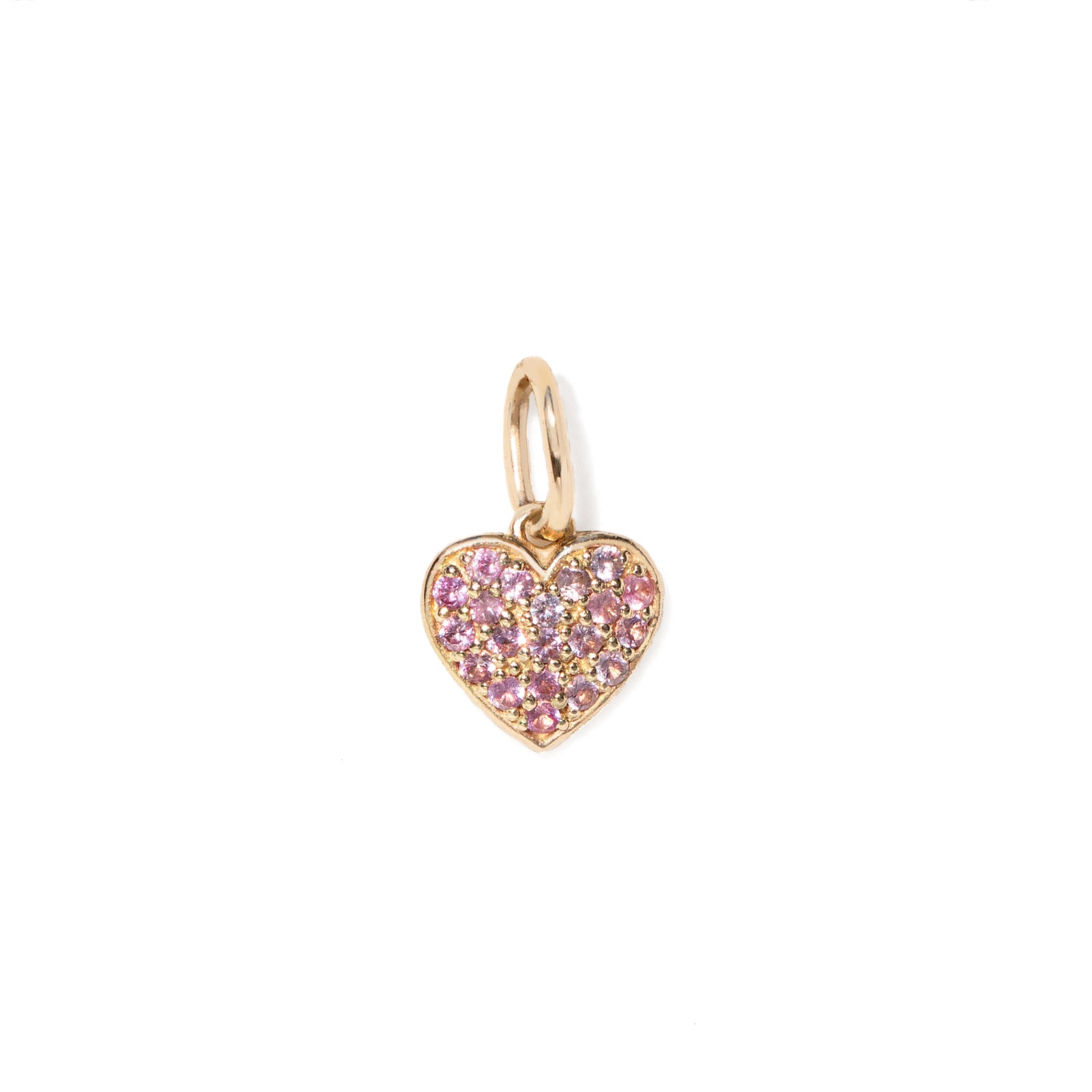 Heart-shaped gold charm with pink stones on a white background