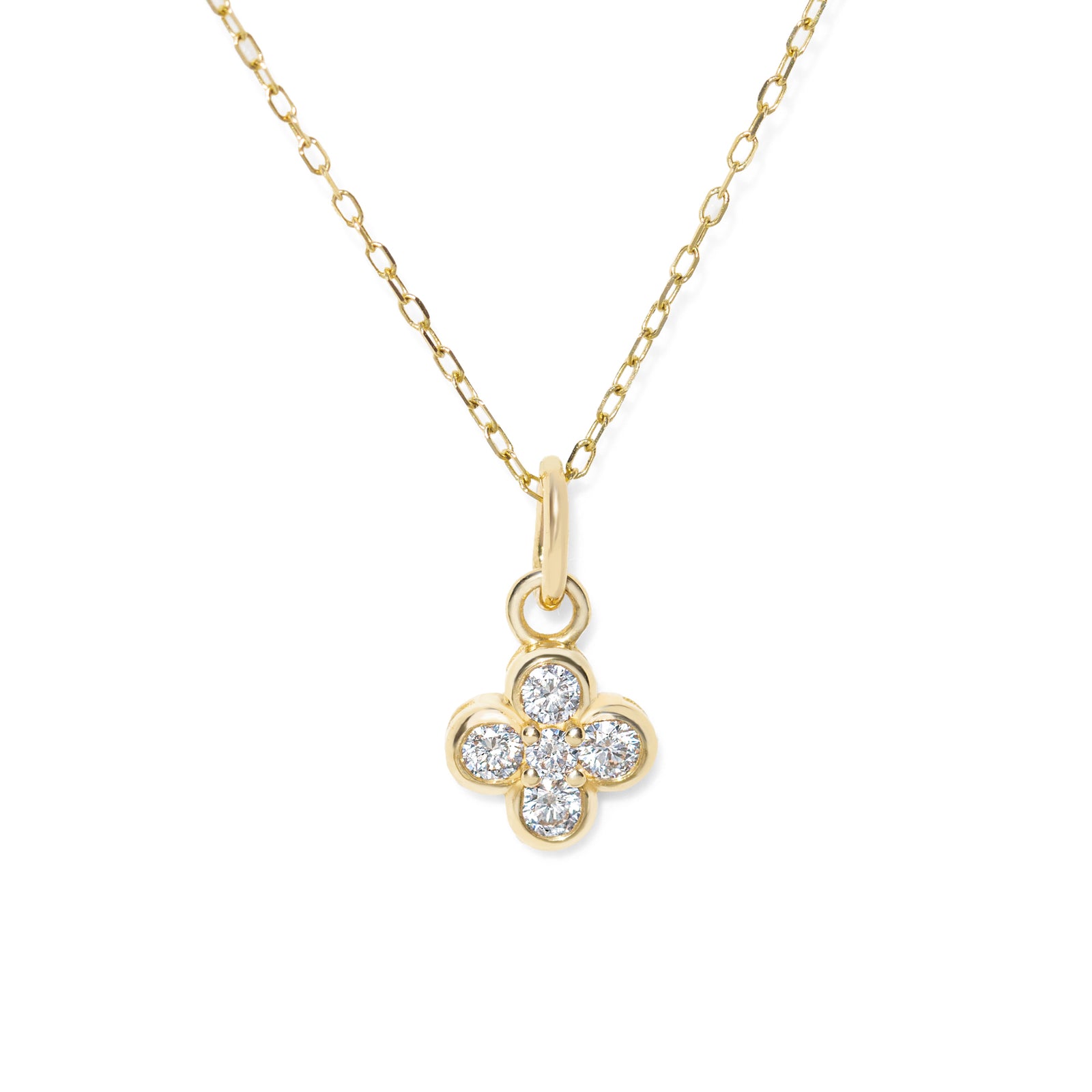 Gold necklace with a diamond-four leaf clover pendant on a white background