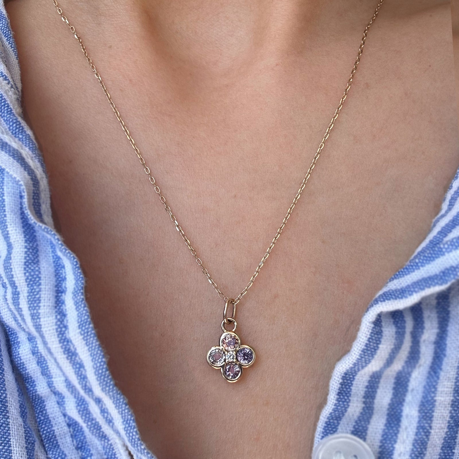 A gemstone necklace worn