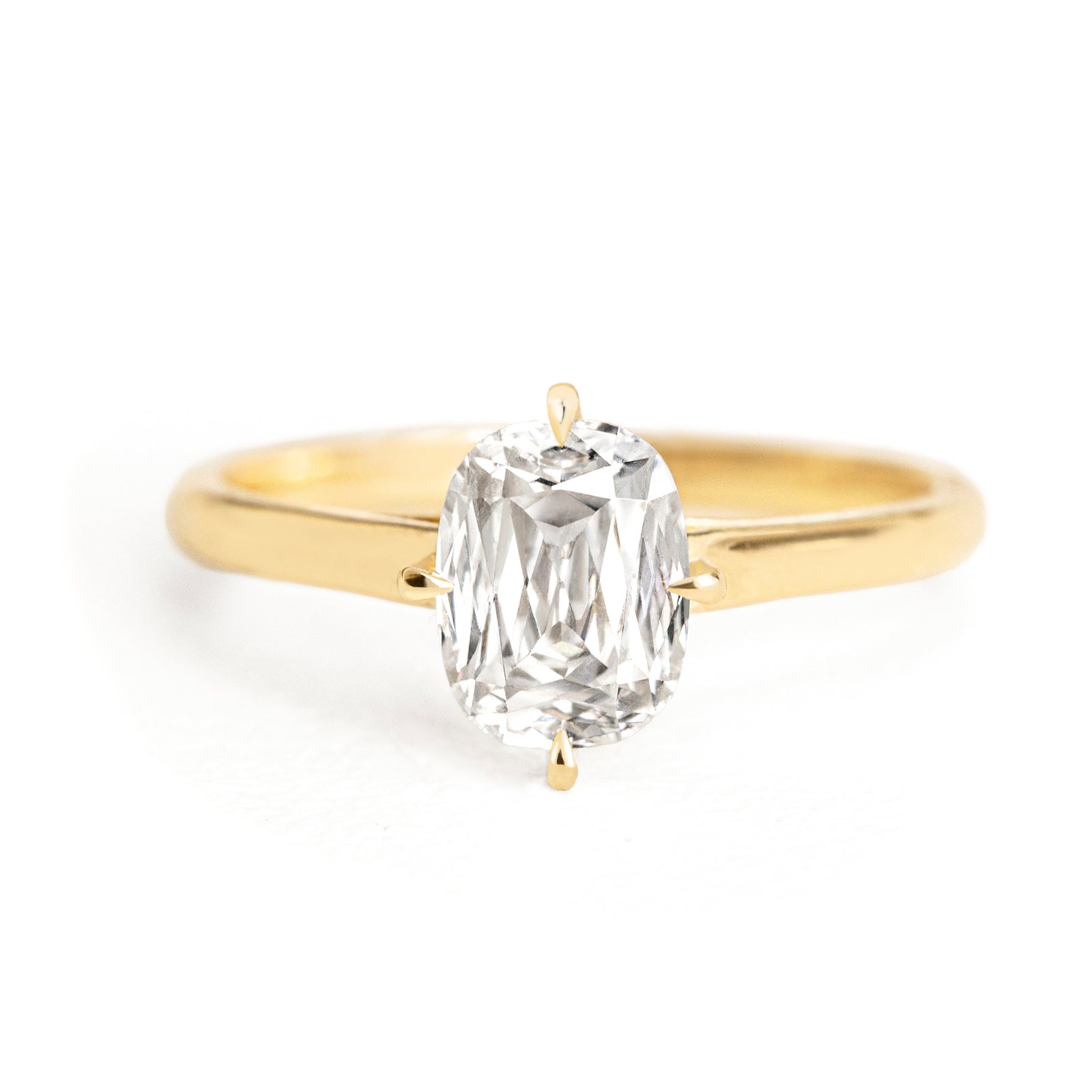 Jamie Park Jewelry| The Harper Ring features criss cut 2CT. moissanite. The criss cut looks larger than the actual carat weight while providing abundant sparkle. With its rounded-corner shape and the Harper's compass setting, this ring creates the mood of an antique-meets-modern look. It's an ideal choice for engagements, milestone celebrations, birthdays, and anniversaries.