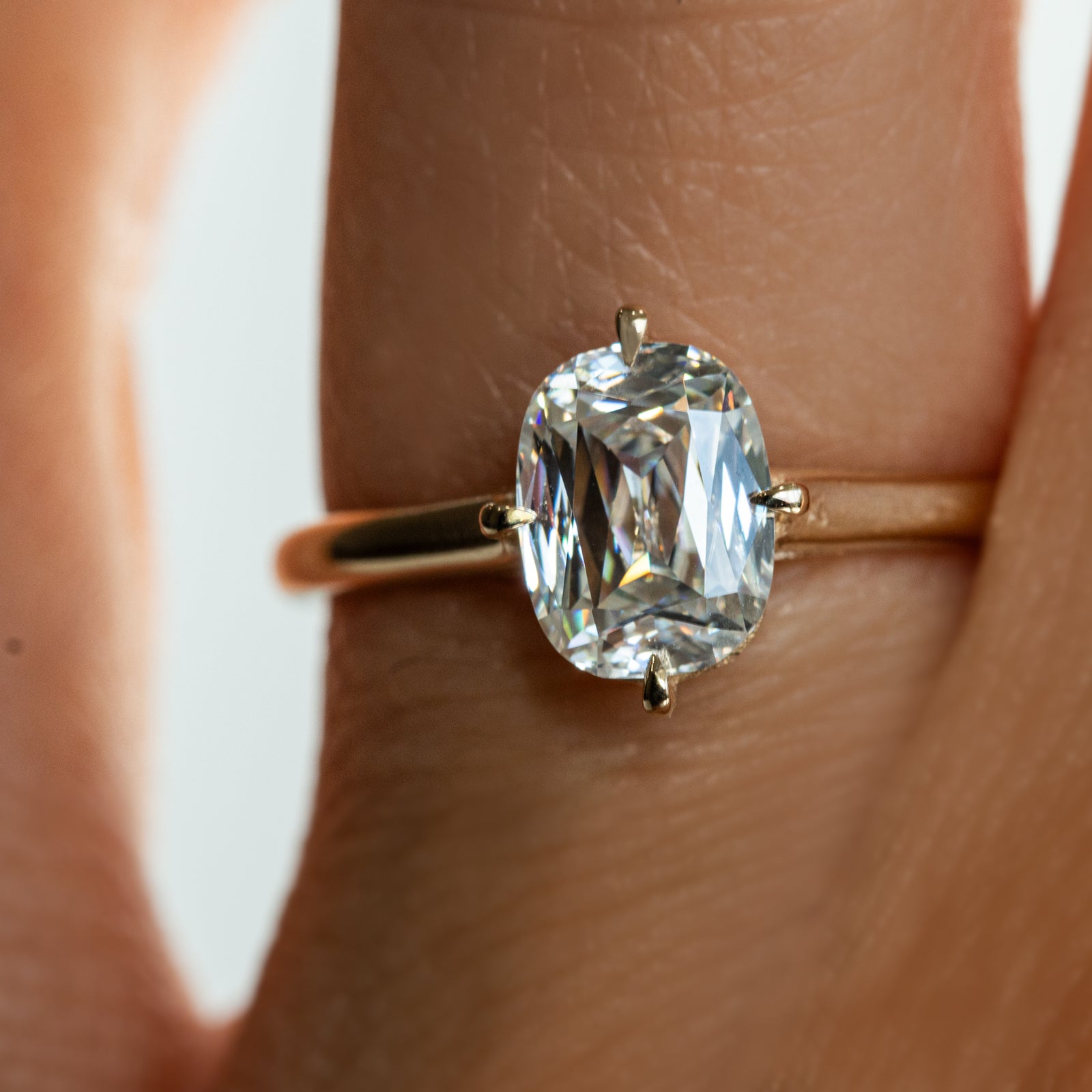 Jamie Park Jewelry| The Harper Ring features criss cut 2CT. moissanite. The criss cut looks larger than the actual carat weight while providing abundant sparkle. With its rounded-corner shape and the Harper's compass setting, this ring creates the mood of an antique-meets-modern look. It's an ideal choice for engagements, milestone celebrations, birthdays, and anniversaries.