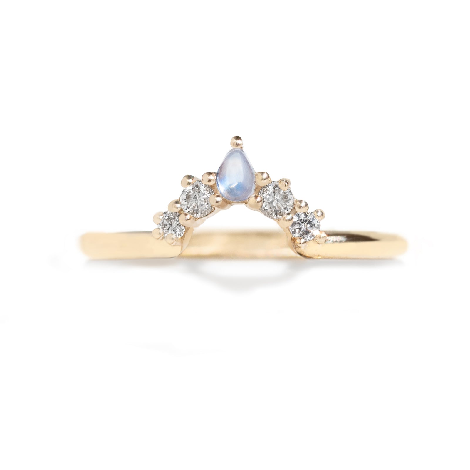  The Blossom Moonstone Contour Band is hand-crafted to complement the stunning Grace Moonstone Ring. Its pear-shaped moonstone perfectly complements the main ring's oval gemstone. 