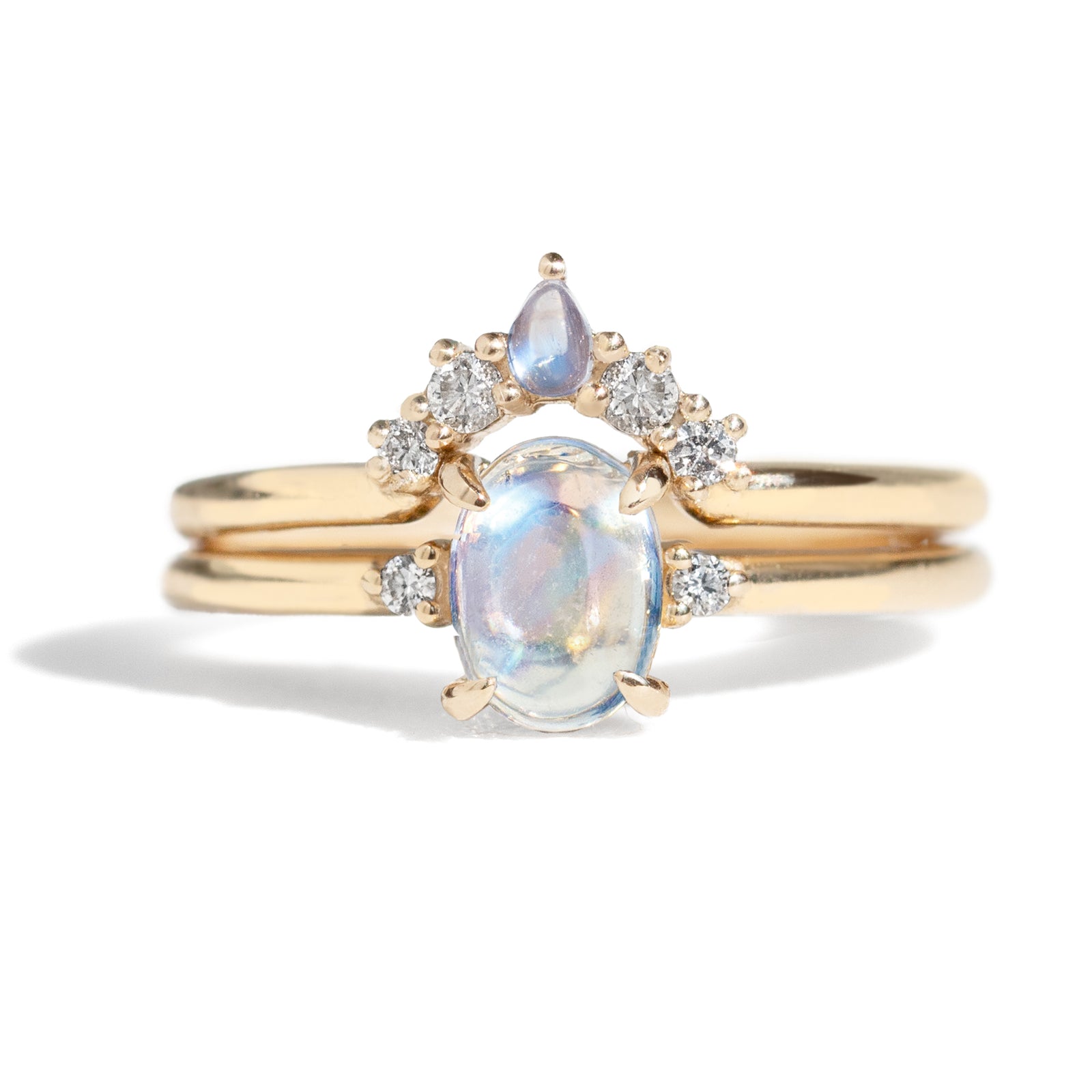  The Blossom Moonstone Contour Band is hand-crafted to complement the stunning Grace Moonstone Ring. Its pear-shaped moonstone perfectly complements the main ring's oval gemstone. 