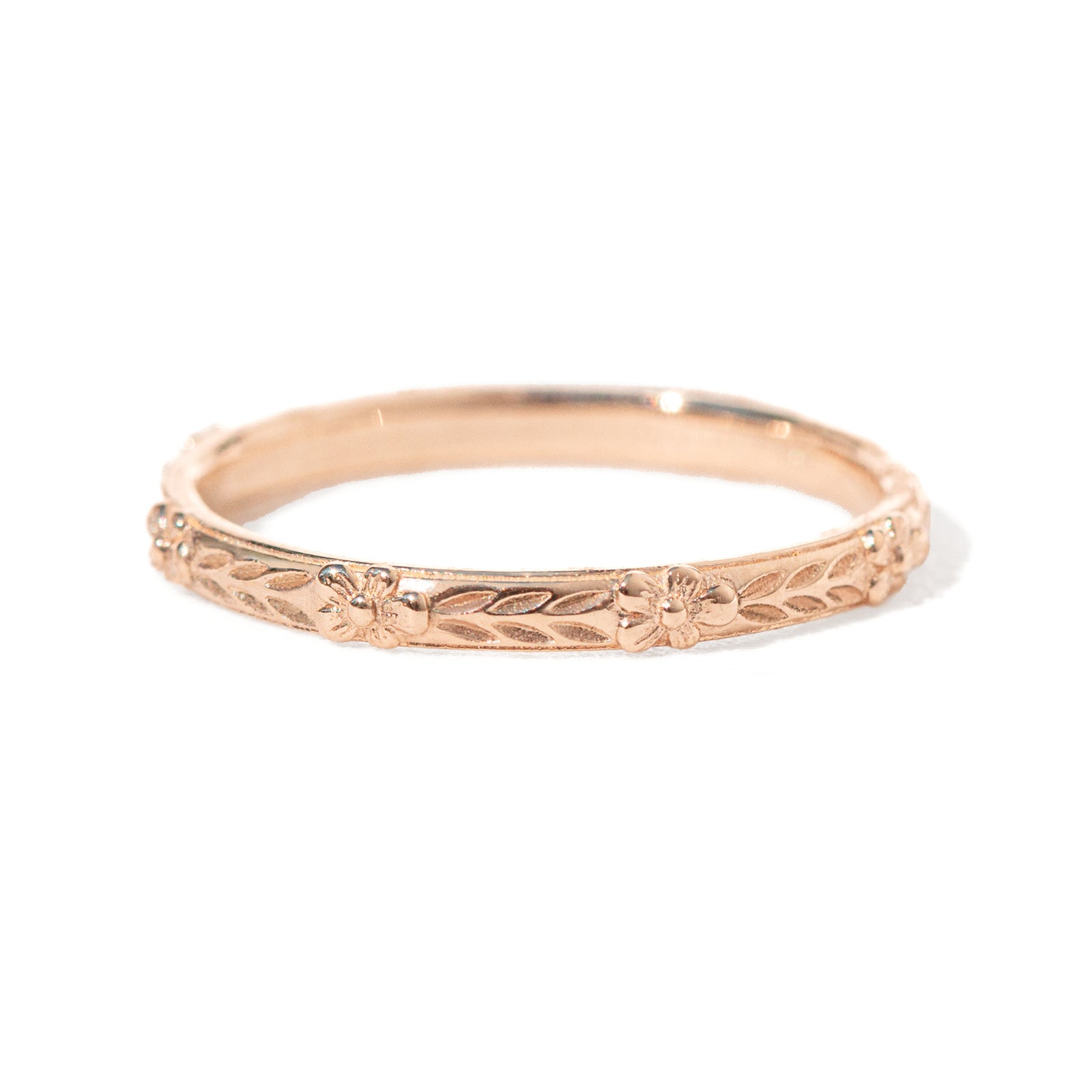 Jamie Park Jewelry - Flower Market Band Add effortless elegance to your everyday style with the Flower Market Band. The intricate vintage inspired pattern exudes sophistication, making it a perfect choice for both casual and formal occasions. Elevate your look with this beautiful and versatile piece, perfect as a standalone band or as a complement to your engagement ring or wedding band. Edit alt text