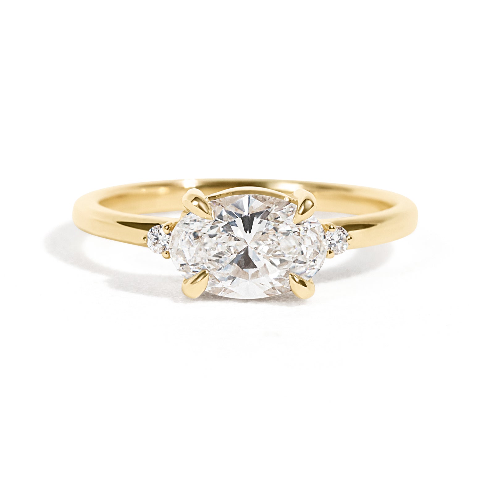 Ella 1ct  East-West Oval Ring-The best-selling Ella Ring has an east-west oval setting that features an oval center diamond or moissanite. Crafted with a timeless and modern style, this ring makes for the perfect engagement ring or anniversary gift.  More carat and color/clarity options are available. Contact us for more information.