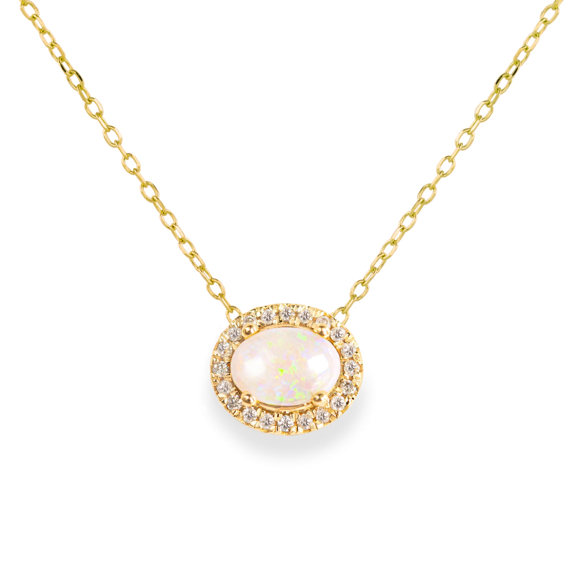 Jamie Park Jewelry -Opal Diamond Halo Necklace This necklace is the epitome of luxury, featuring an oval Australian opal surrounded by a radiant halo of natural diamonds. A symbol of hope and purity, it makes the perfect gift for any special occasion.