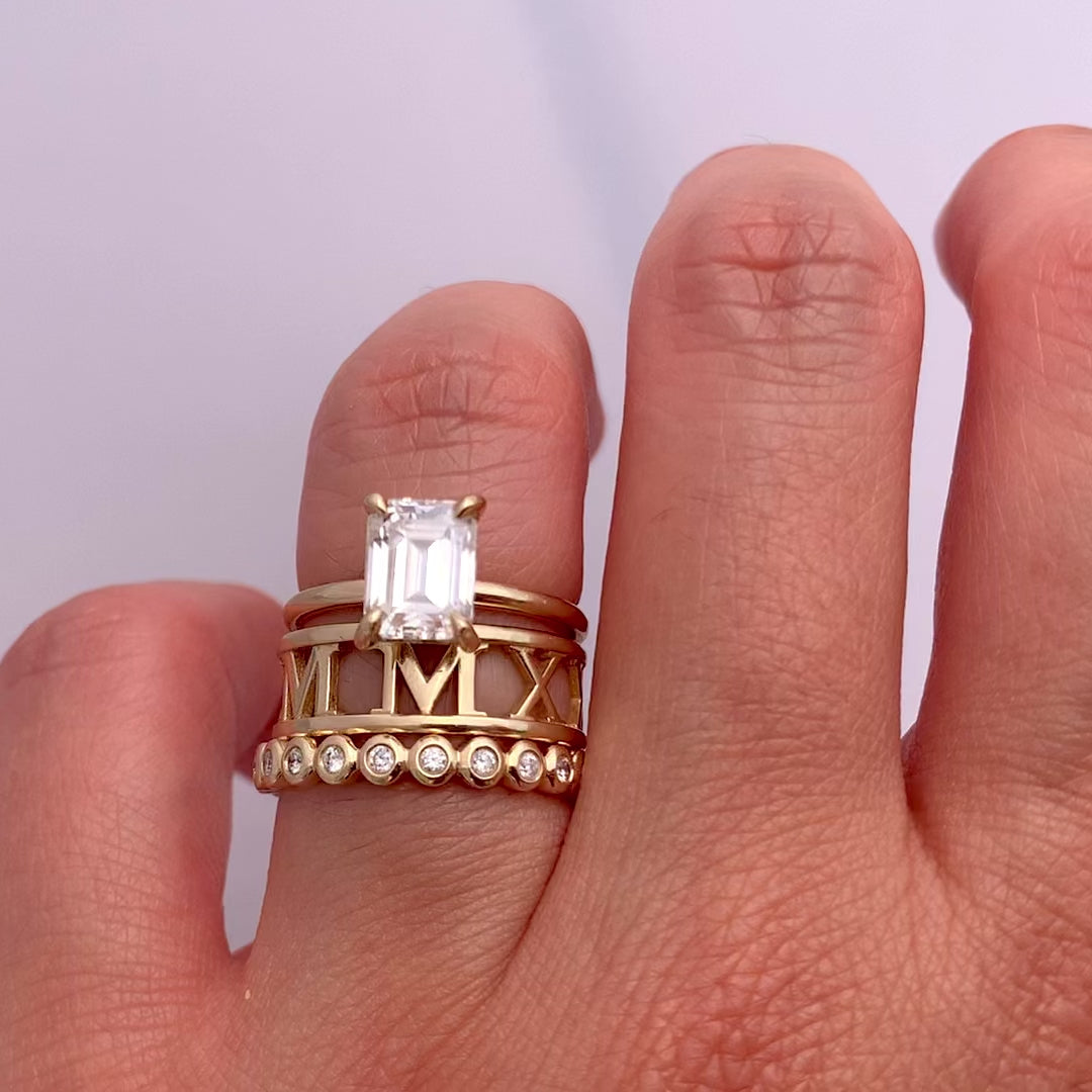 The Roman Numeral Band is a perfect gift for birthday, anniversary or graduation.  This personalized band can also be a great wedding band. It comes in 4.5mm and 6mm widths, ensuring a perfect match for our settings. 