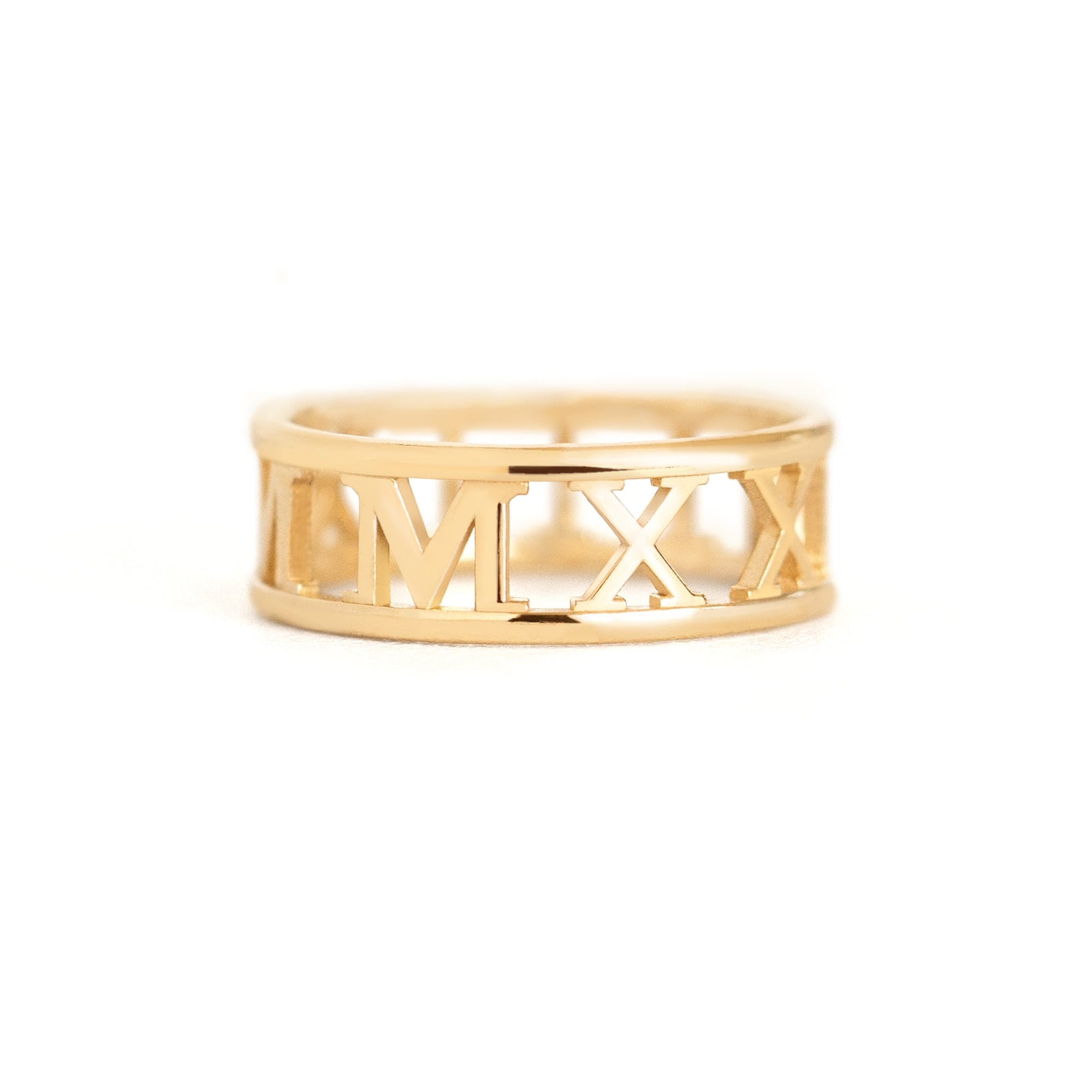 custom Roman numeral band in yellow gold