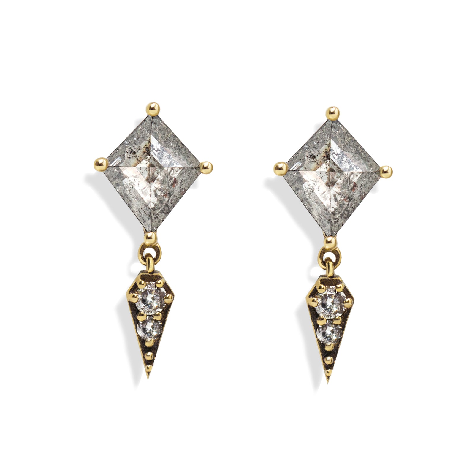 A striking blend of edge and elegance, these earrings feature 1.1 total carats of kite-cut salt and pepper diamonds set in an antique-finished setting. The modern silhouette is elevated by sleek kite-shaped charms, making them the perfect statement earrings for both everyday wear and evenings out. This item is one of a kind.&nbsp;