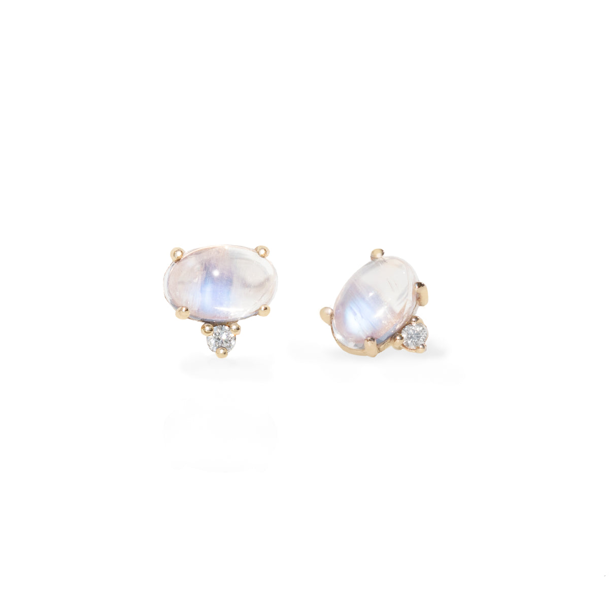 A pair of gold-toned oval stud earrings featuring iridescent moonstone centers with small clear accent stones, shown on a clean white background.