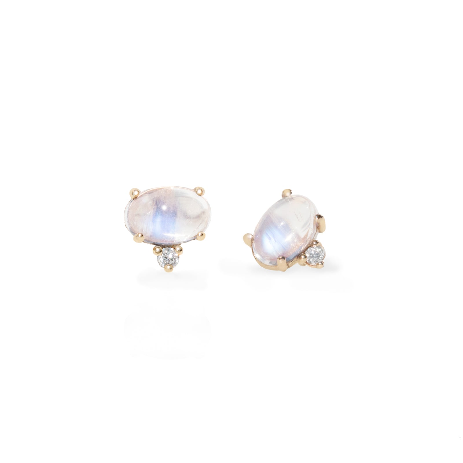 A pair of gold-toned oval stud earrings featuring iridescent moonstone centers with small clear accent stones, shown on a clean white background.
