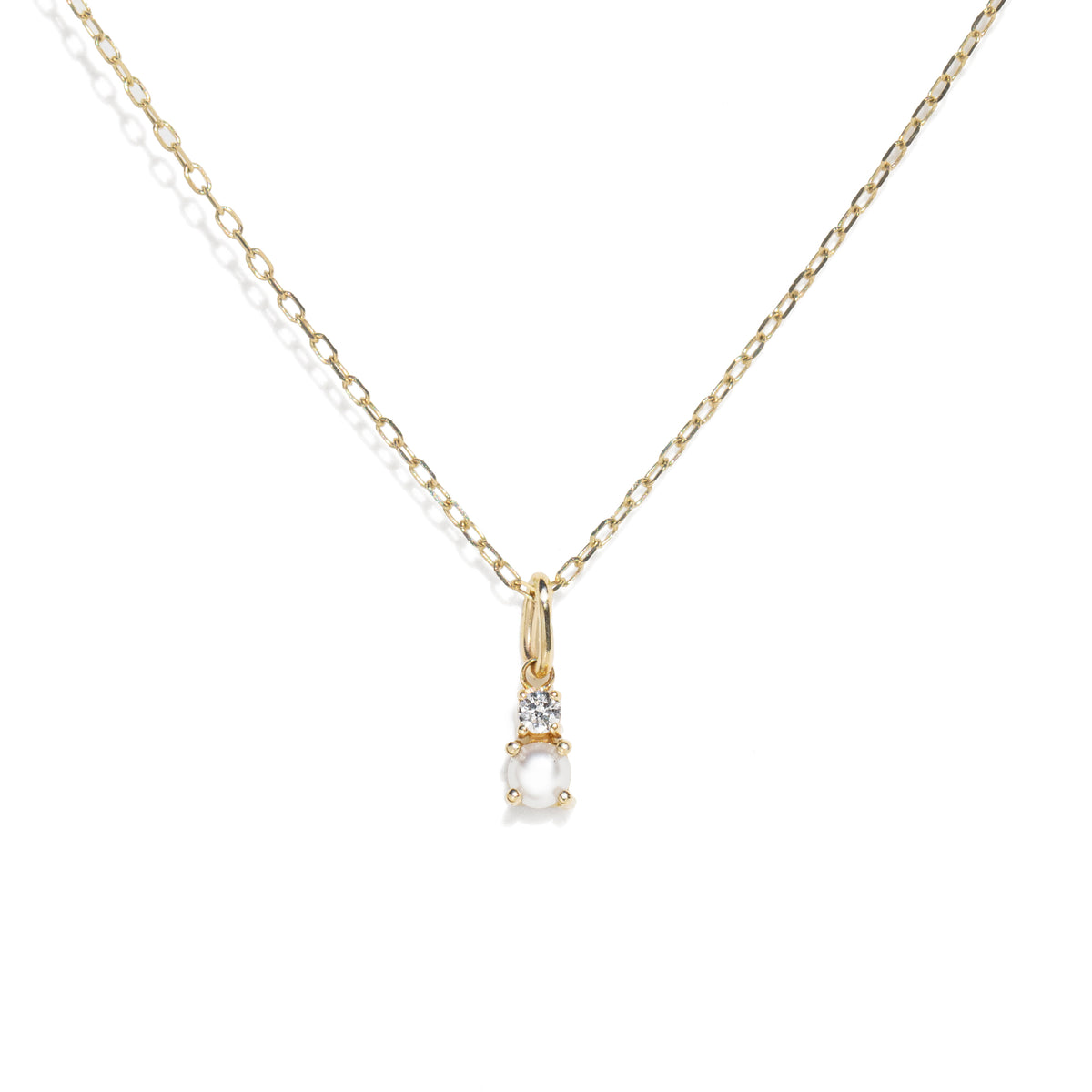 Gold necklace with a pendant on a white background