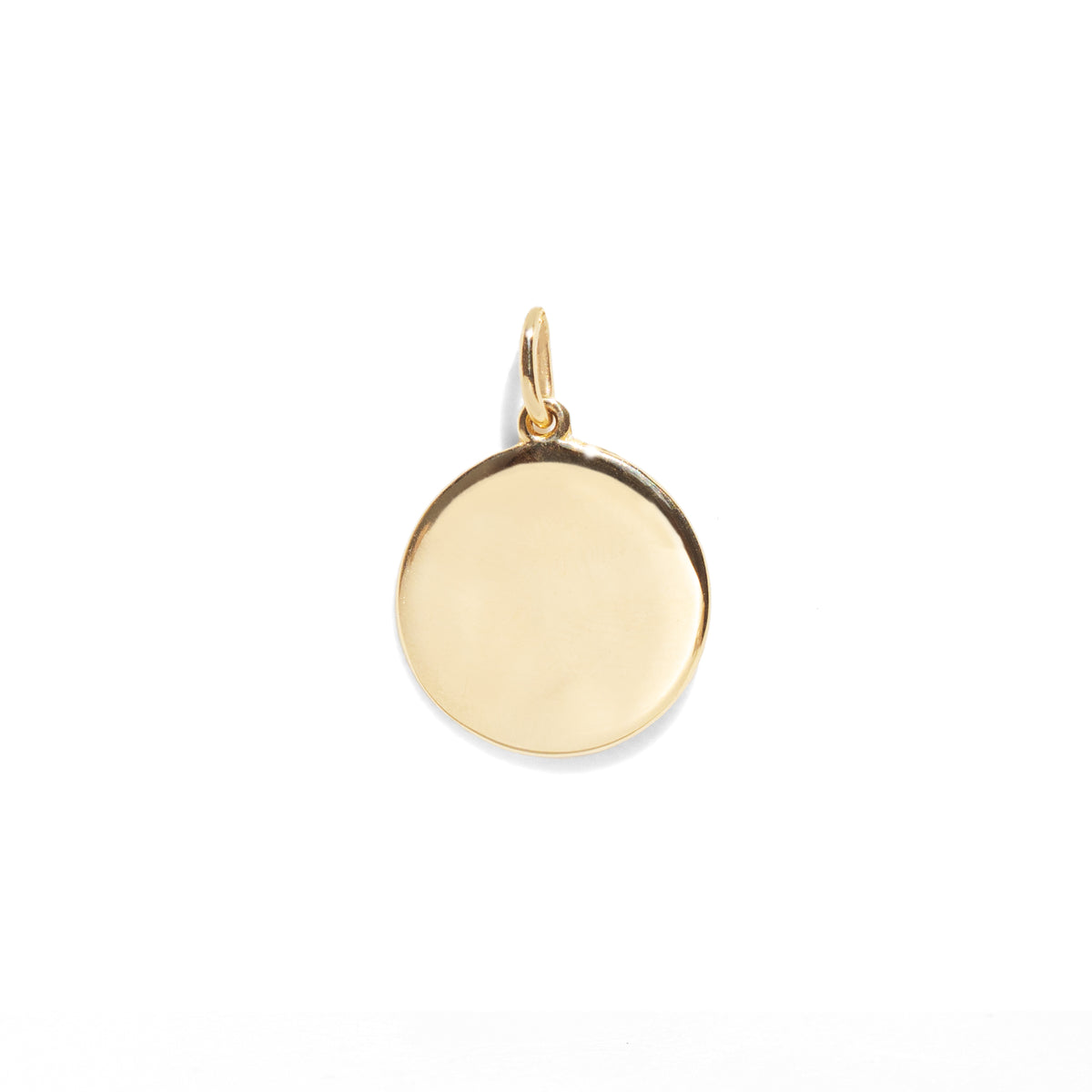 Gold pendant on a white background