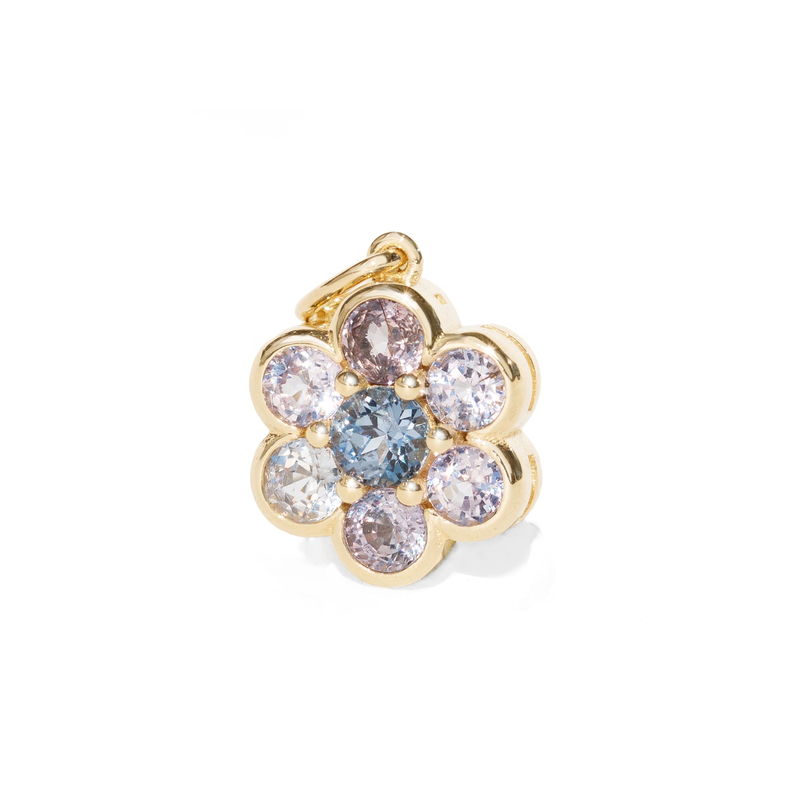 A gold flower-shaped charm pendant featuring a central round blue gemstone surrounded by six smaller round gemstones in pale pink, clear, and light blue, set in a polished gold bezel on a white background.
