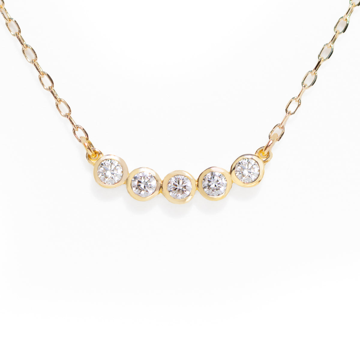 This customer&#39;s favorite Five Diamond Necklace is a go-to for any wardrobe. Effortlessly dressing up any look for the office, it can also be used to add a touch of sparkle for an evening out. Its sleek design makes it perfect for solo or layered styling. 16-18&quot; adjustable size.