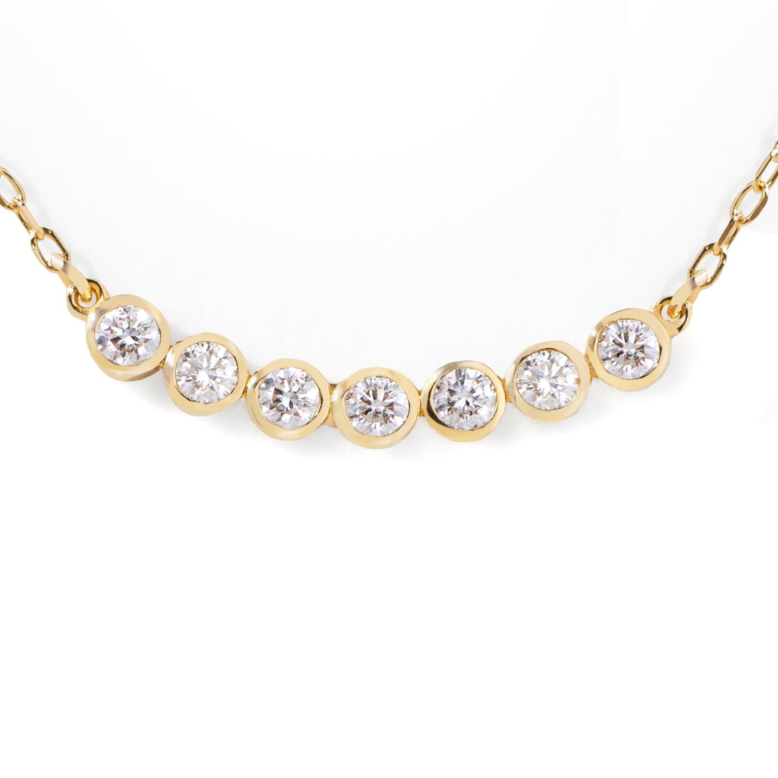 This customer's favorite Seven Diamond Necklace is a go-to for any wardrobe. Effortlessly dressing up any look for the office, it can also be used to add a touch of sparkle for an evening out. Its sleek design makes it perfect for solo or layered styling. 16-18" adjustable size.