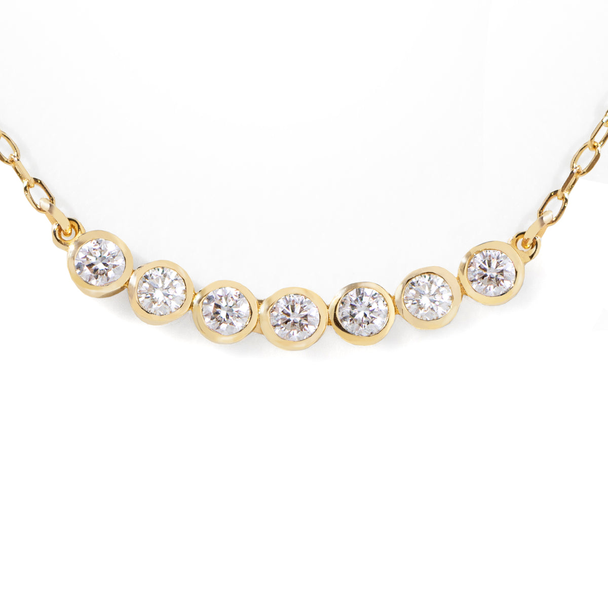 This customer&#39;s favorite Seven Diamond Necklace is a go-to for any wardrobe. Effortlessly dressing up any look for the office, it can also be used to add a touch of sparkle for an evening out. Its sleek design makes it perfect for solo or layered styling. 16-18&quot; adjustable size.