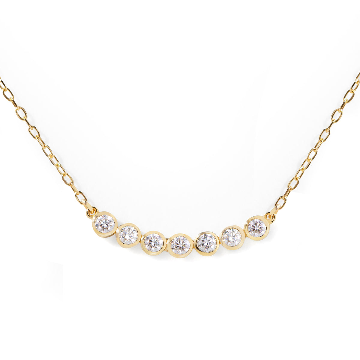 This customer's favorite Seven Diamond Necklace is a go-to for any wardrobe. Effortlessly dressing up any look for the office, it can also be used to add a touch of sparkle for an evening out. Its sleek design makes it perfect for solo or layered styling. 16-18" adjustable size.