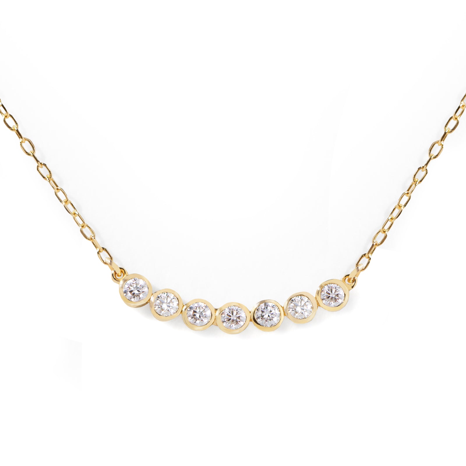 This customer's favorite Seven Diamond Necklace is a go-to for any wardrobe. Effortlessly dressing up any look for the office, it can also be used to add a touch of sparkle for an evening out. Its sleek design makes it perfect for solo or layered styling. 16-18" adjustable size.