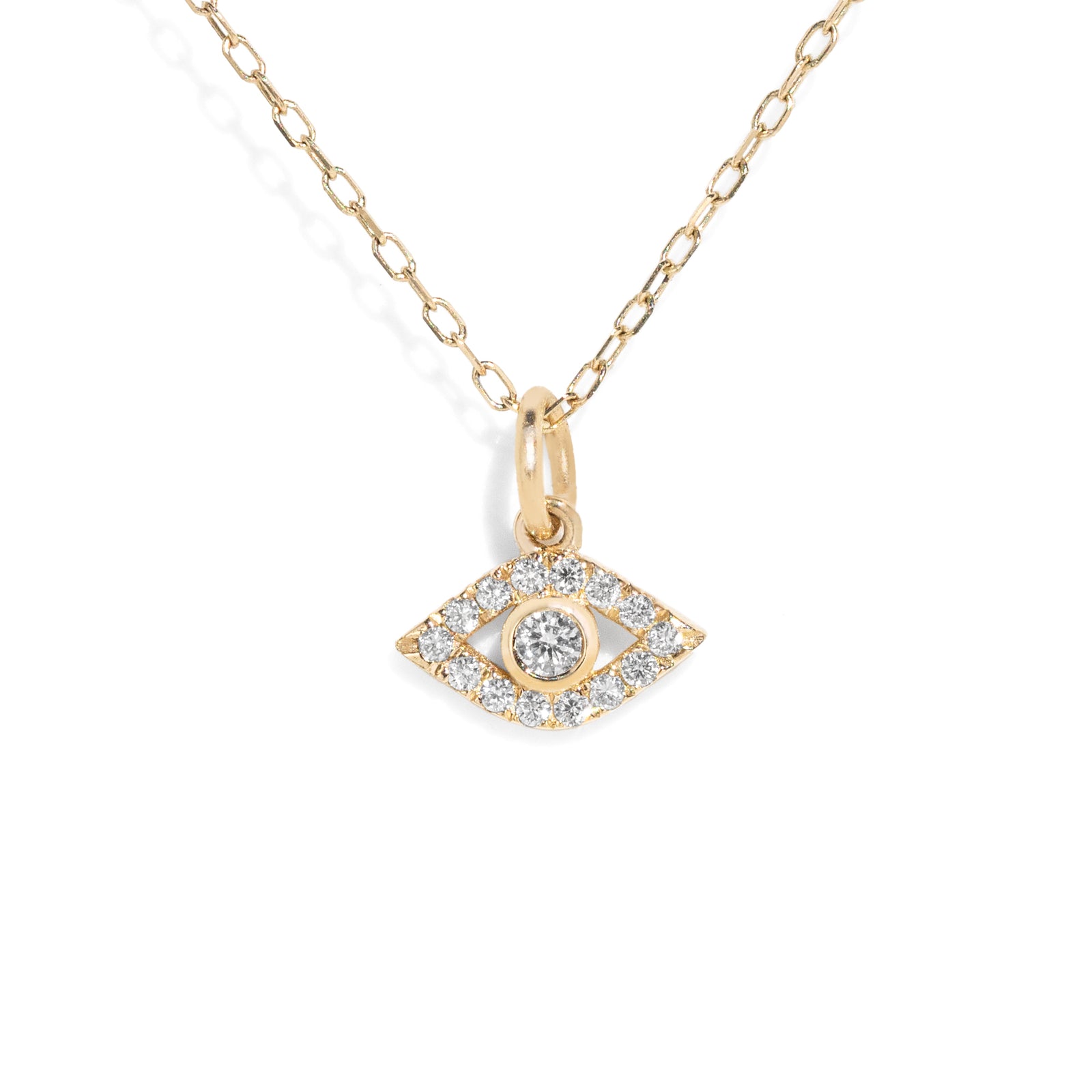 Gold necklace with an diamond accented evil eye pendant on a white background