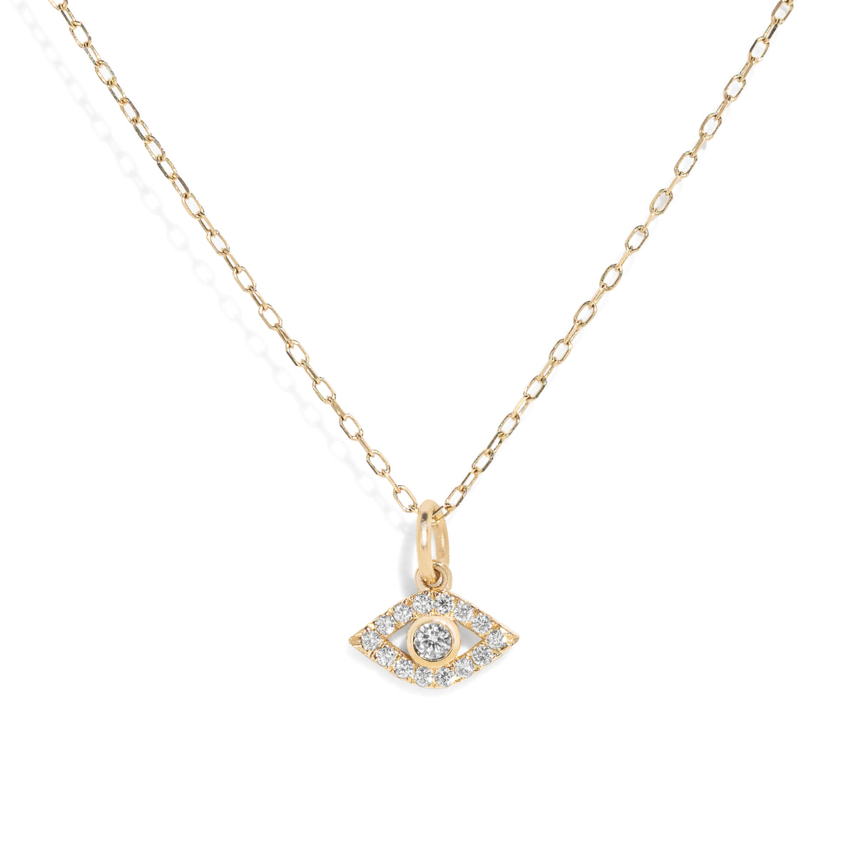 Gold necklace with an diamond accented evil eye pendant on a white background