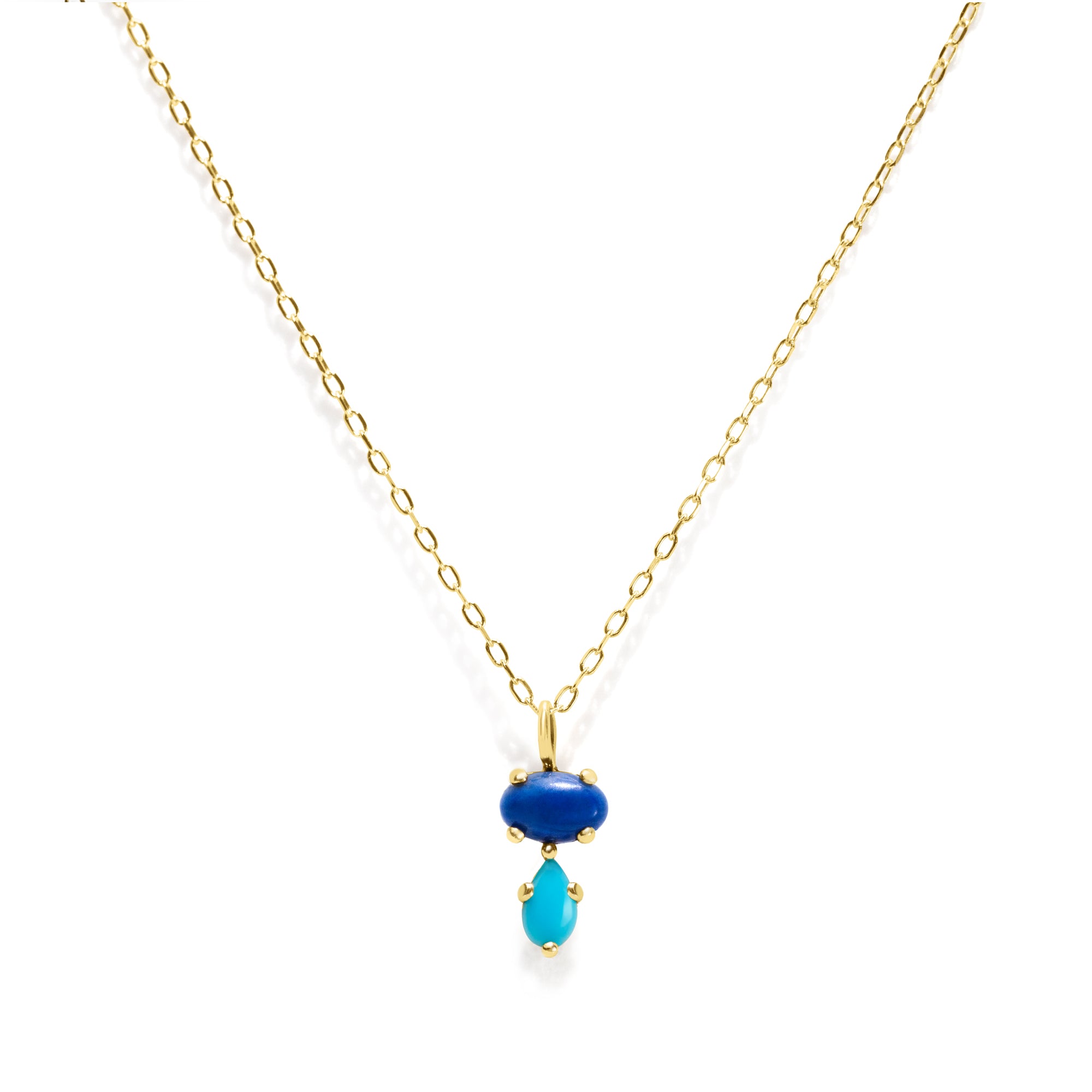 Add a vibrant touch of color with our Bubble Drop Necklace, featuring an oval lapis lazuli and a pear-cut turquoise, set in solid 14K gold. Inspired by the beauty of a cool summer night by the beach, this delicate blue gemstone necklace evokes the deep blue sky above the clear ocean. Perfect for everyday wear or as a thoughtful gift.
