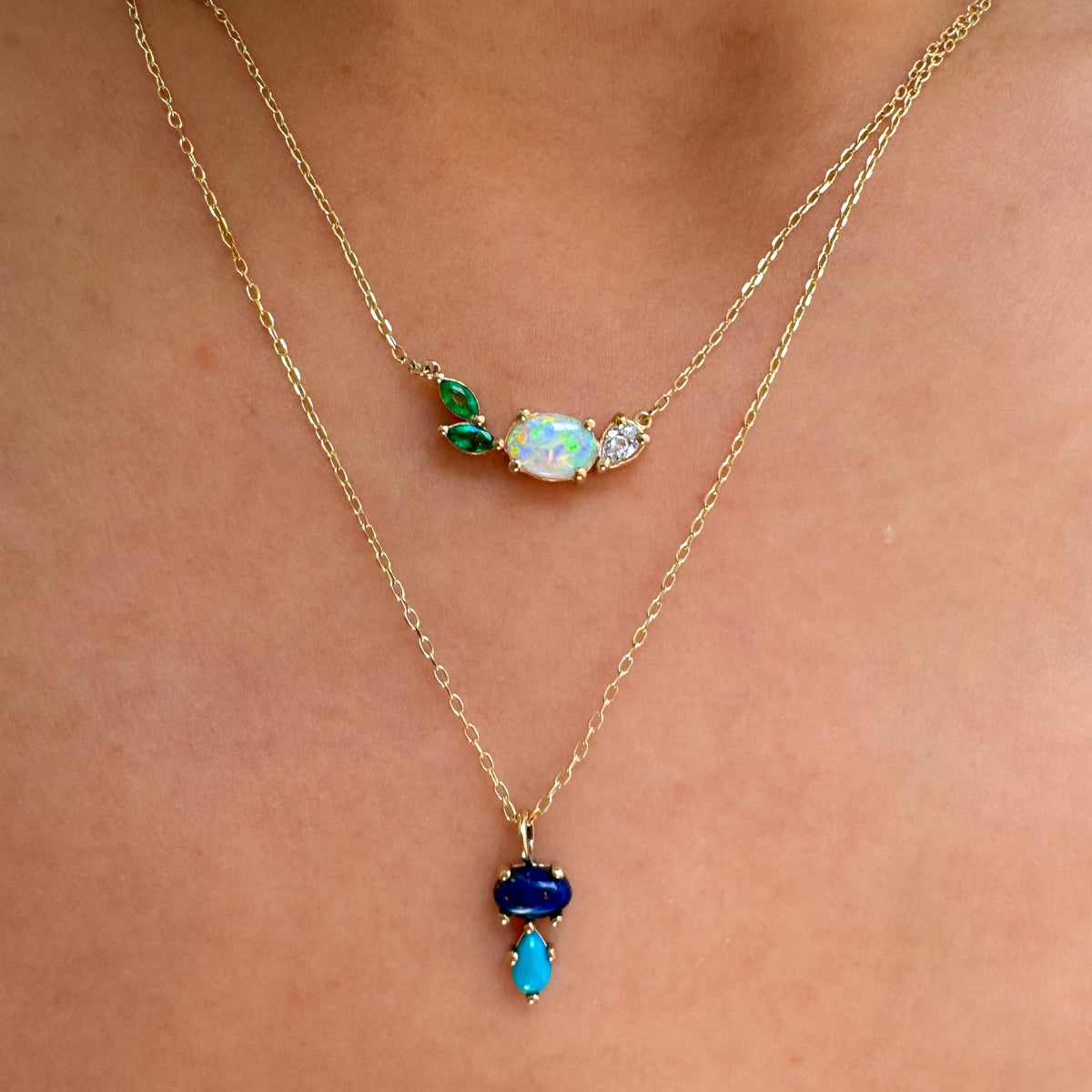 Add a vibrant touch of color with our Bubble Drop Necklace, featuring an oval lapis lazuli and a pear-cut turquoise, set in solid 14K gold. Inspired by the beauty of a cool summer night by the beach, this delicate blue gemstone necklace evokes the deep blue sky above the clear ocean. Perfect for everyday wear or as a thoughtful gift.
