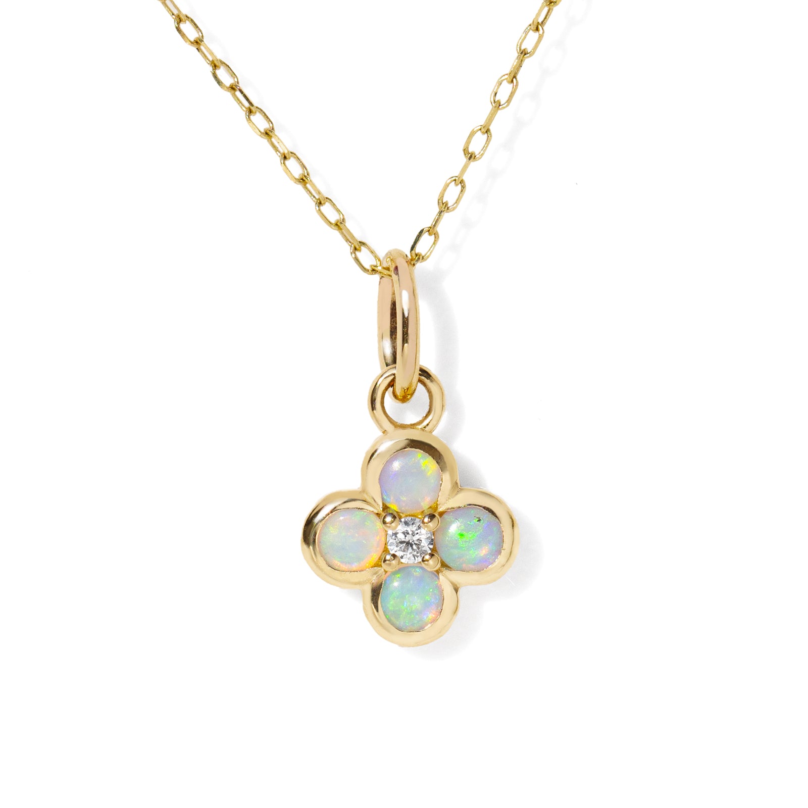 Gold necklace with a four-leaf clover pendant featuring opal stones on a white background