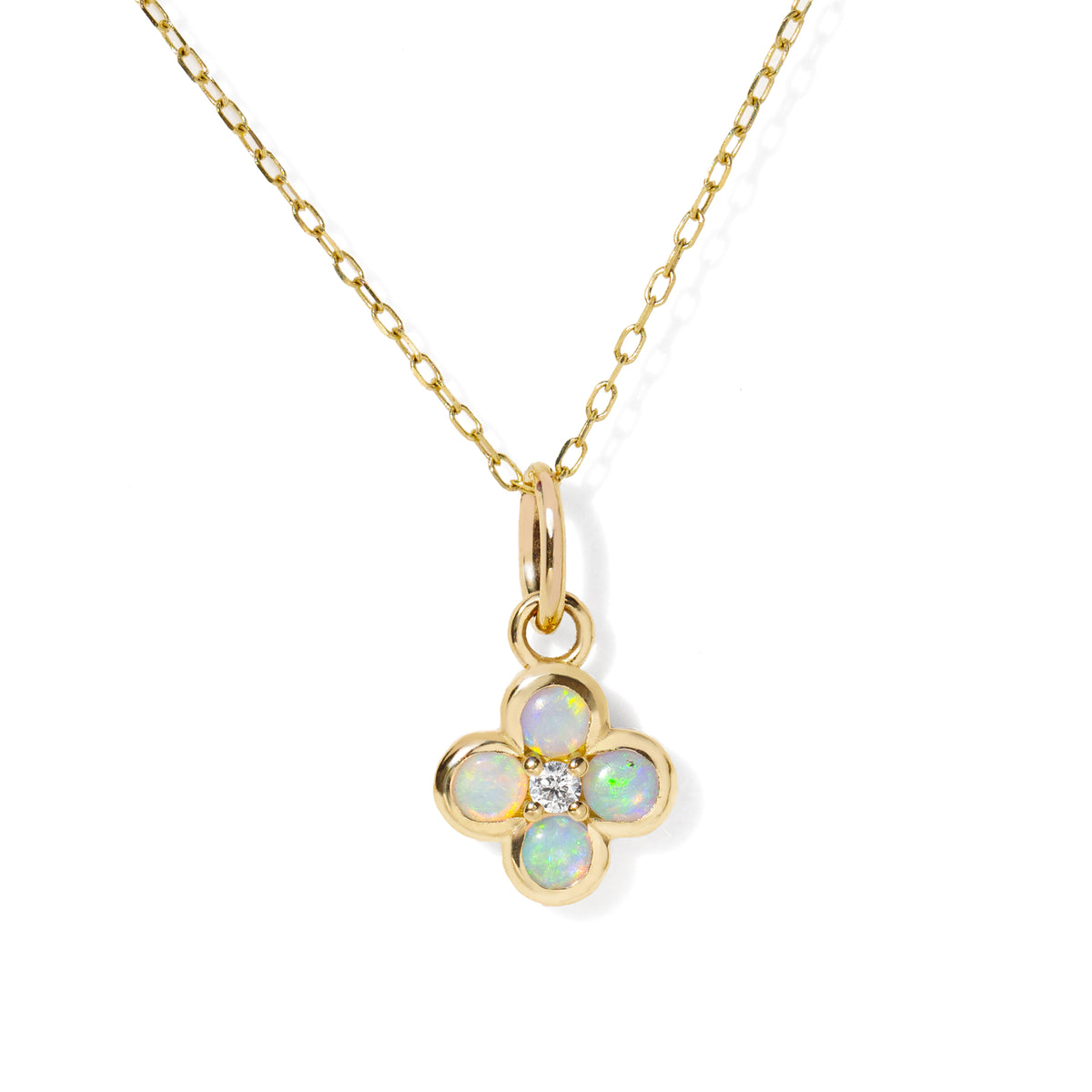 Gold necklace with a four-leaf clover opal diamond pendant on a white background