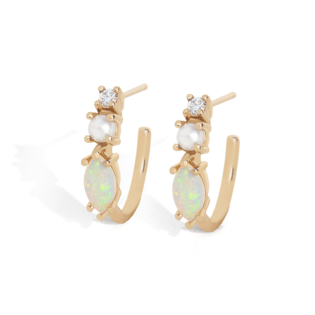 Inspired by our bestselling ring, these 14K gold hoops feature marquise-cut natural Australian opals, freshwater pearls, and natural diamonds – the perfect balance of uniqueness and simplicity for everyday wear. &amp;nbsp;