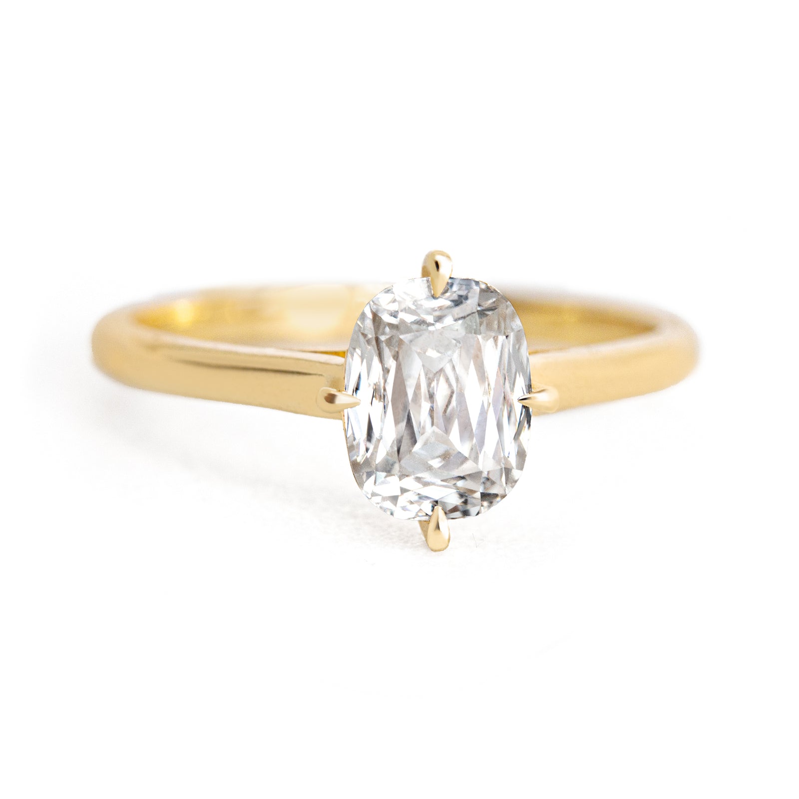 Jamie Park Jewelry| The Harper Ring features criss cut 2CT. moissanite. The criss cut looks larger than the actual carat weight while providing abundant sparkle. With its rounded-corner shape and the Harper's compass setting, this ring creates the mood of an antique-meets-modern look. It's an ideal choice for engagements, milestone celebrations, birthdays, and anniversaries.