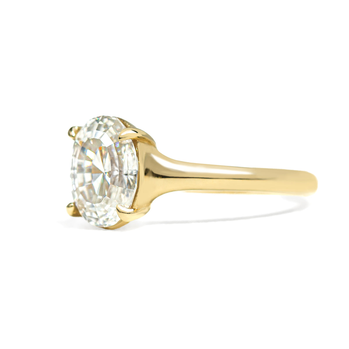Oval step cut 2ct diamond ring on white background 