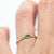 Made for vintage lovers, this Marquise Emerald Three Stone Ring features a bold green emerald in a marquise cut, complemented by sparkling diamonds on either side, all set in a beautiful milgrain setting. Its elegant yet understated design makes it ideal for everyday wear, a thoughtful gift, or as a delicate engagement ring.