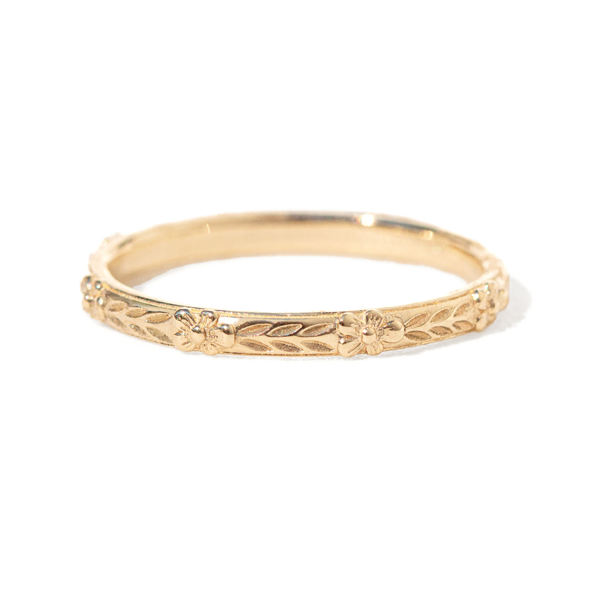 Jamie Park Jewelry - Flower Market Band Add effortless elegance to your everyday style with the Flower Market Band. The intricate vintage inspired pattern exudes sophistication, making it a perfect choice for both casual and formal occasions. Elevate your look with this beautiful and versatile piece, perfect as a standalone band or as a complement to your engagement ring or wedding band. Edit alt text