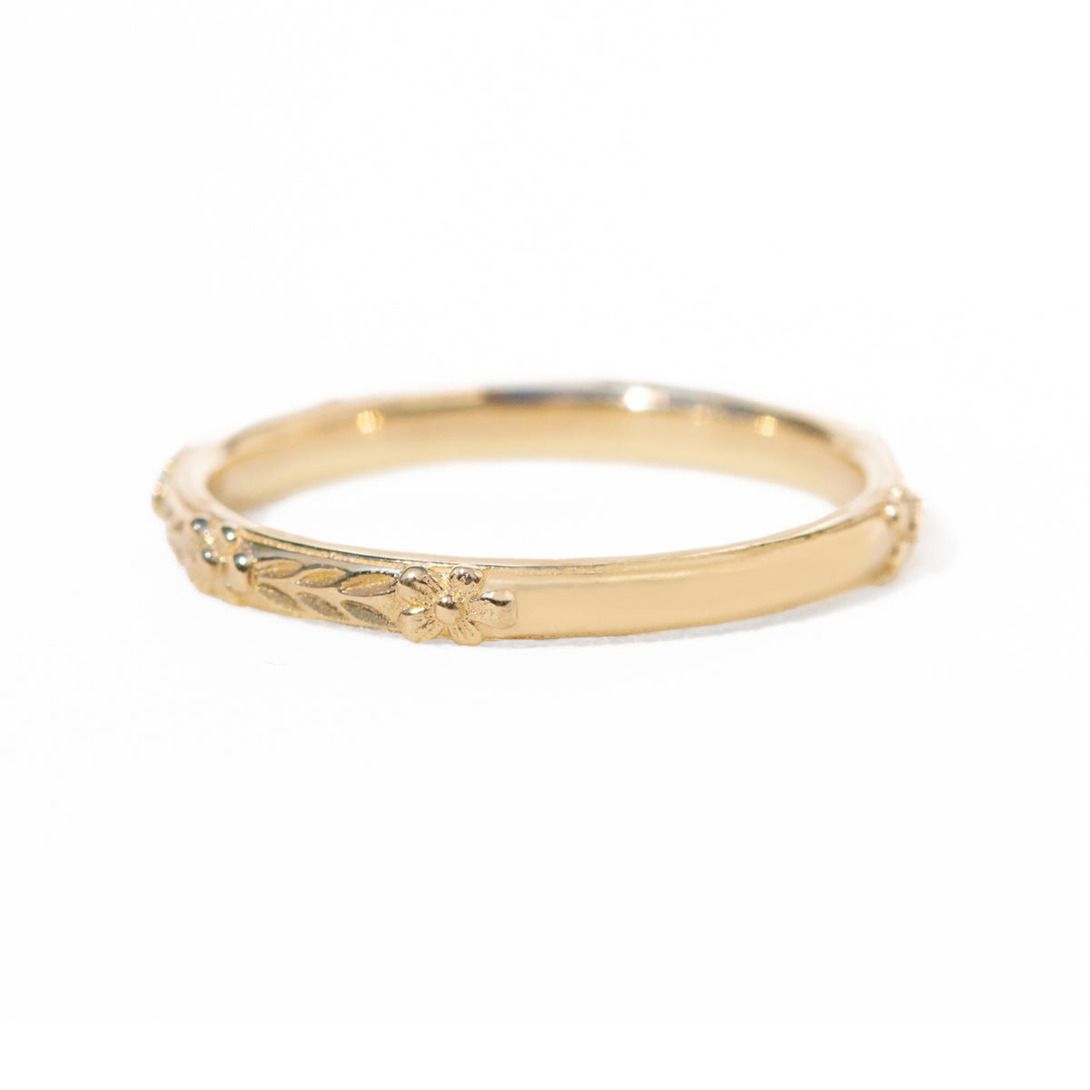 Jamie Park Jewelry - Flower Market Band Add effortless elegance to your everyday style with the Flower Market Band. The intricate vintage inspired pattern exudes sophistication, making it a perfect choice for both casual and formal occasions. Elevate your look with this beautiful and versatile piece, perfect as a standalone band or as a complement to your engagement ring or wedding band. Edit alt text