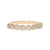 Gold ring with ten diamonds on a white background with beaded setting