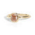 Gold ring with a brown diamond on a white background