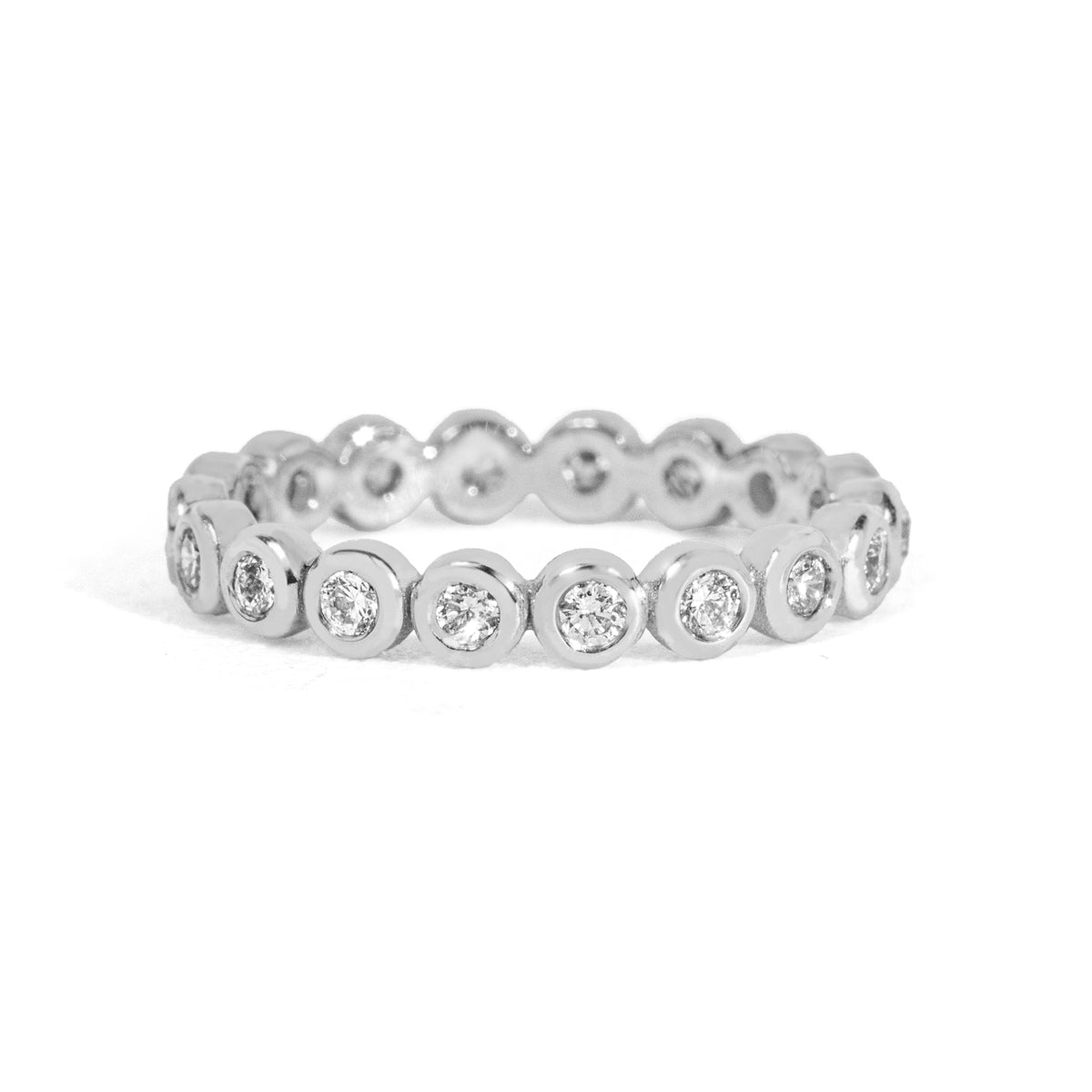 White gold ring with embedded diamonds on a white background