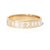 Gold ring with Roman numerals and star design on a white background