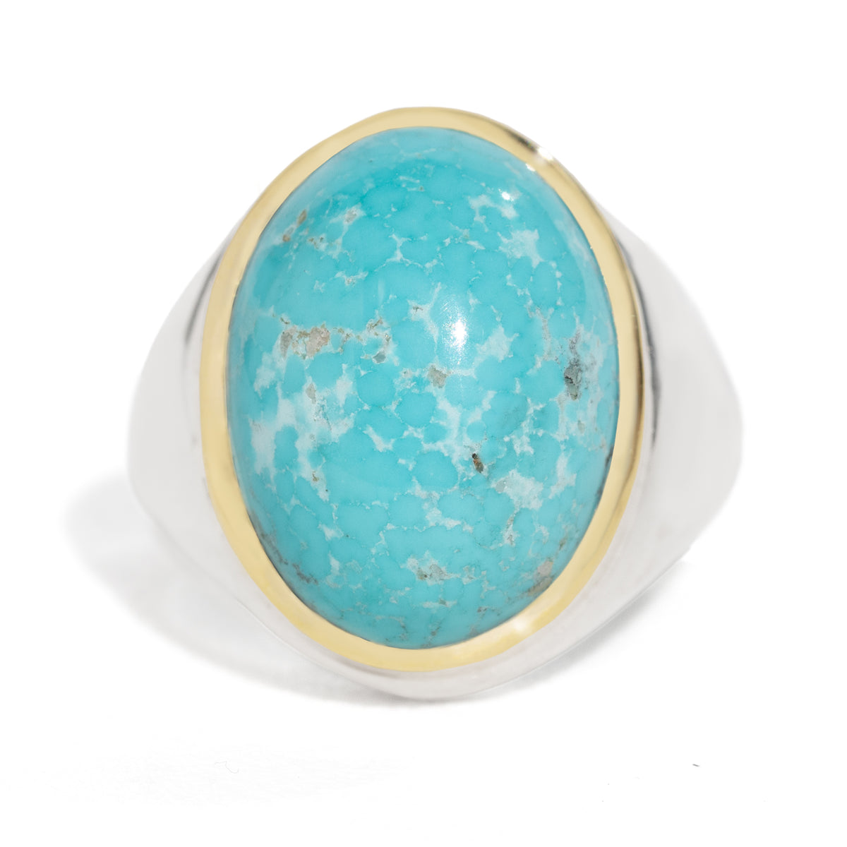 Turquoise stone ring with gold and silver band on a white background
