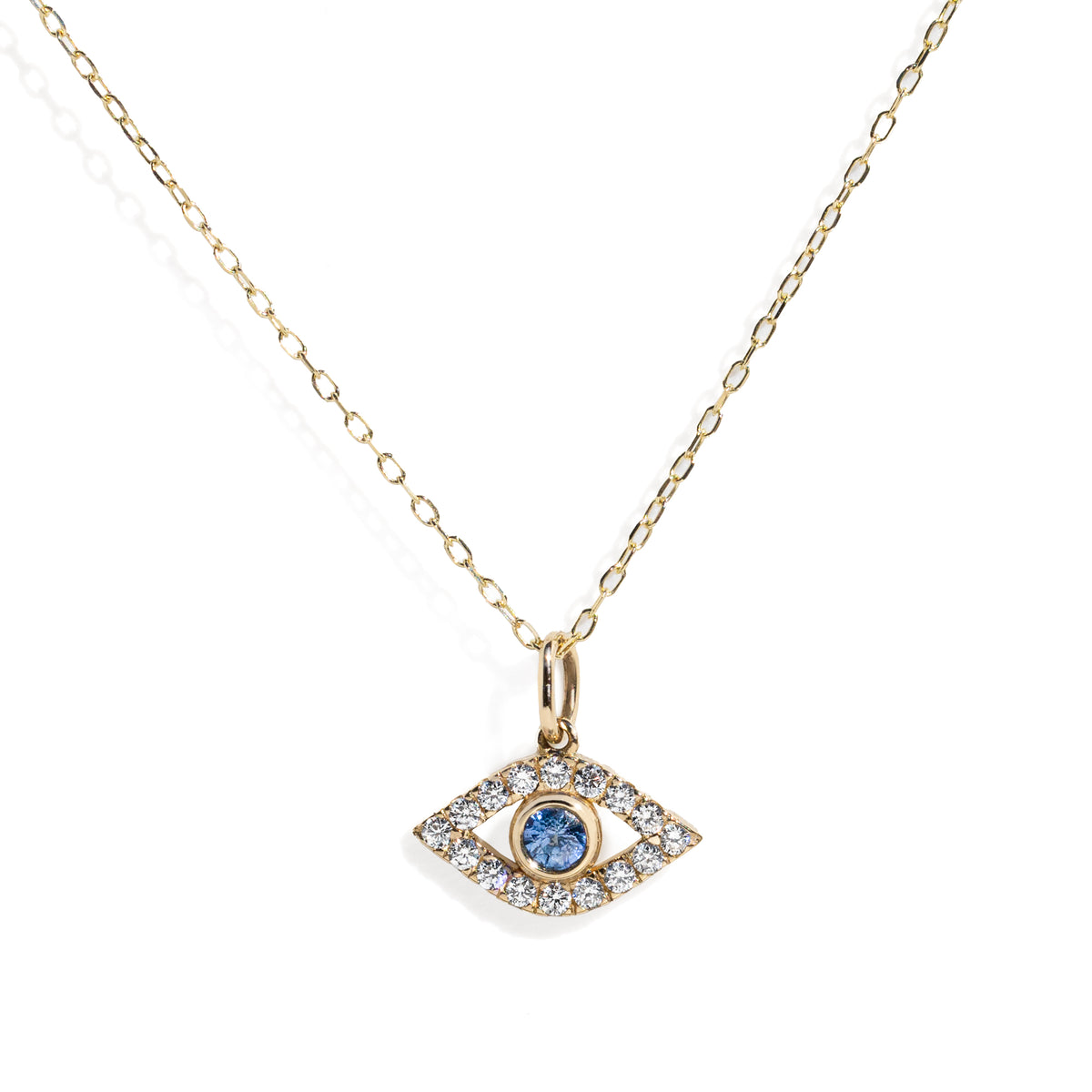 Gold evil eye necklace with an eye-shaped pendant featuring a blue gemstone on a white background