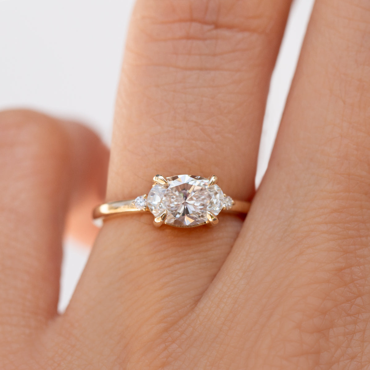 Ella 1ct  East-West Oval Ring-The best-selling Ella Ring has an east-west oval setting that features an oval center diamond or moissanite. Crafted with a timeless and modern style, this ring makes for the perfect engagement ring or anniversary gift.  More carat and color/clarity options are available. Contact us for more information.