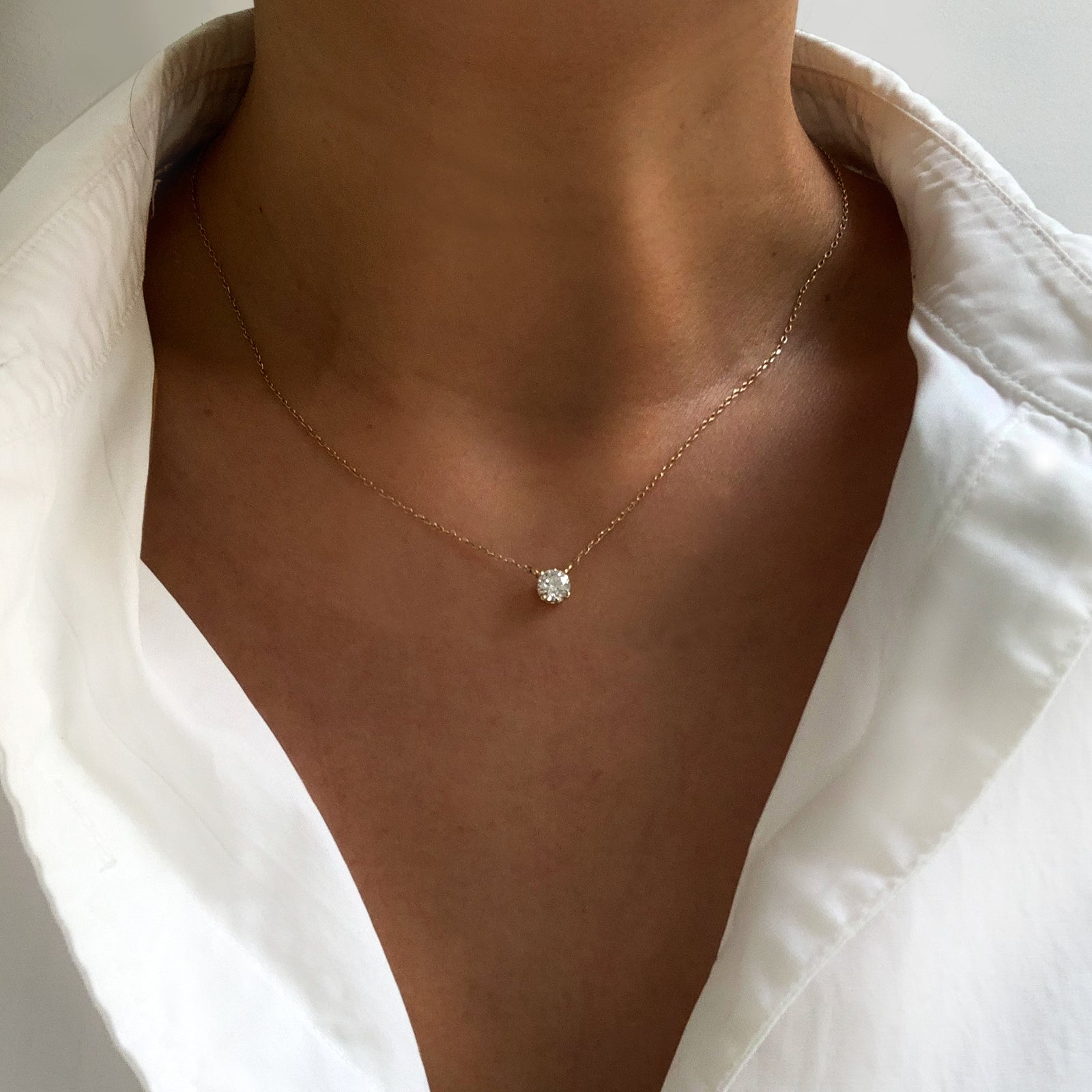 Jamie Park Jewelry - Round Diamond Solitaire Necklace This Round Diamond Solitaire Necklace features a sparkling lab diamond, set in a classic four prong design. With each diamond certified by IGI, this necklace makes for a timeless and cherished gift, perfect for any special occasion. Add a touch of elegance to any outfit with this beautiful piece. Chain length 16-18"&nbsp;