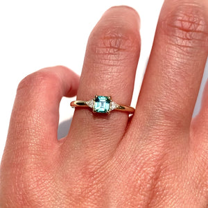 0.7ct. Teal Sapphire Trillion Diamond Ring